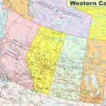 This map shows provinces, cities, towns, highways, roads, railways, ferry routes, and national parks in Western Canada.